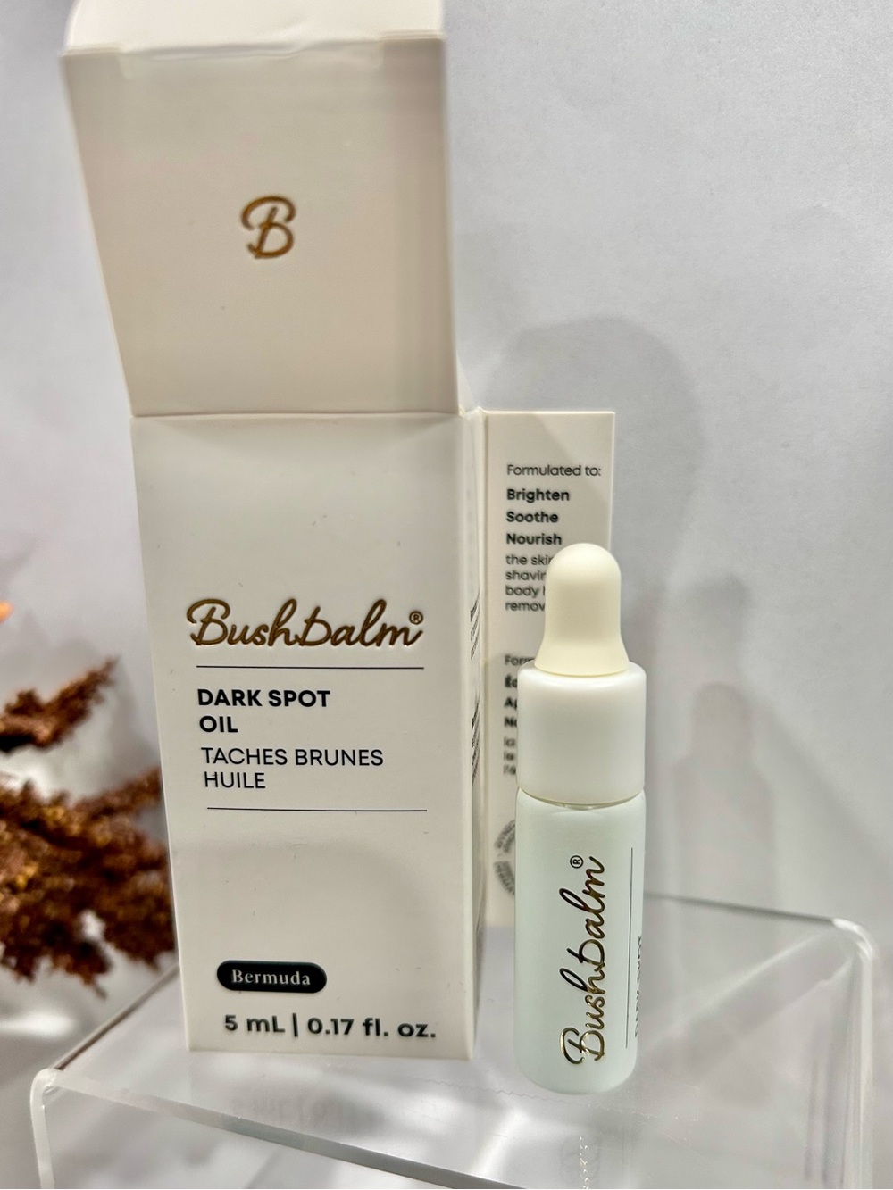 Bushbalm Bermuda Dark Spot Oil in a travel-size 5ml (0.17 fl. oz.) bottle